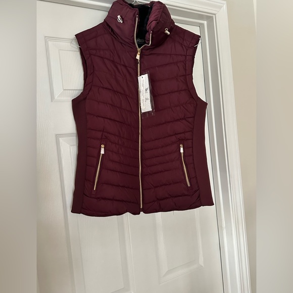 Jackets & Blazers - NWT ready for the cold weather in this burgundy puffer vest with fur lining